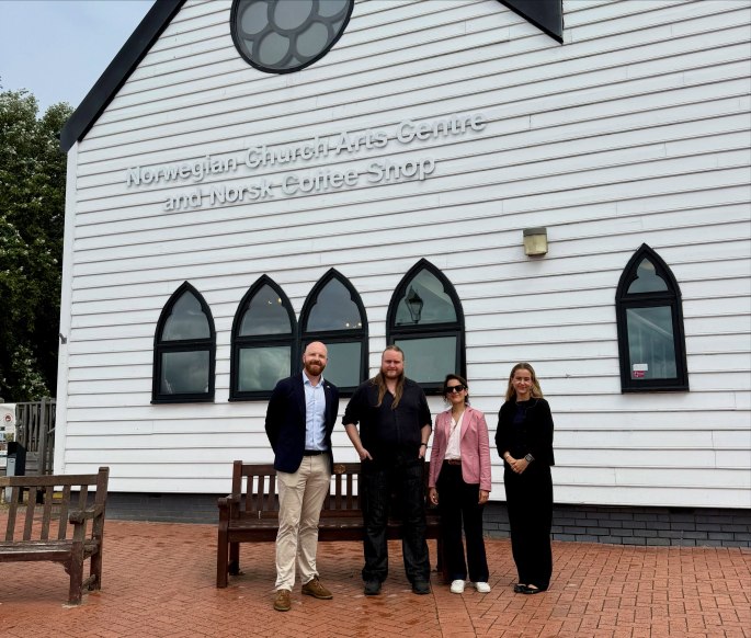 Heritage officer Thomas Husøy welcomes a delegation from the Norwegian Embassy in the UK to the Norwegian Church in Cardiff Bay